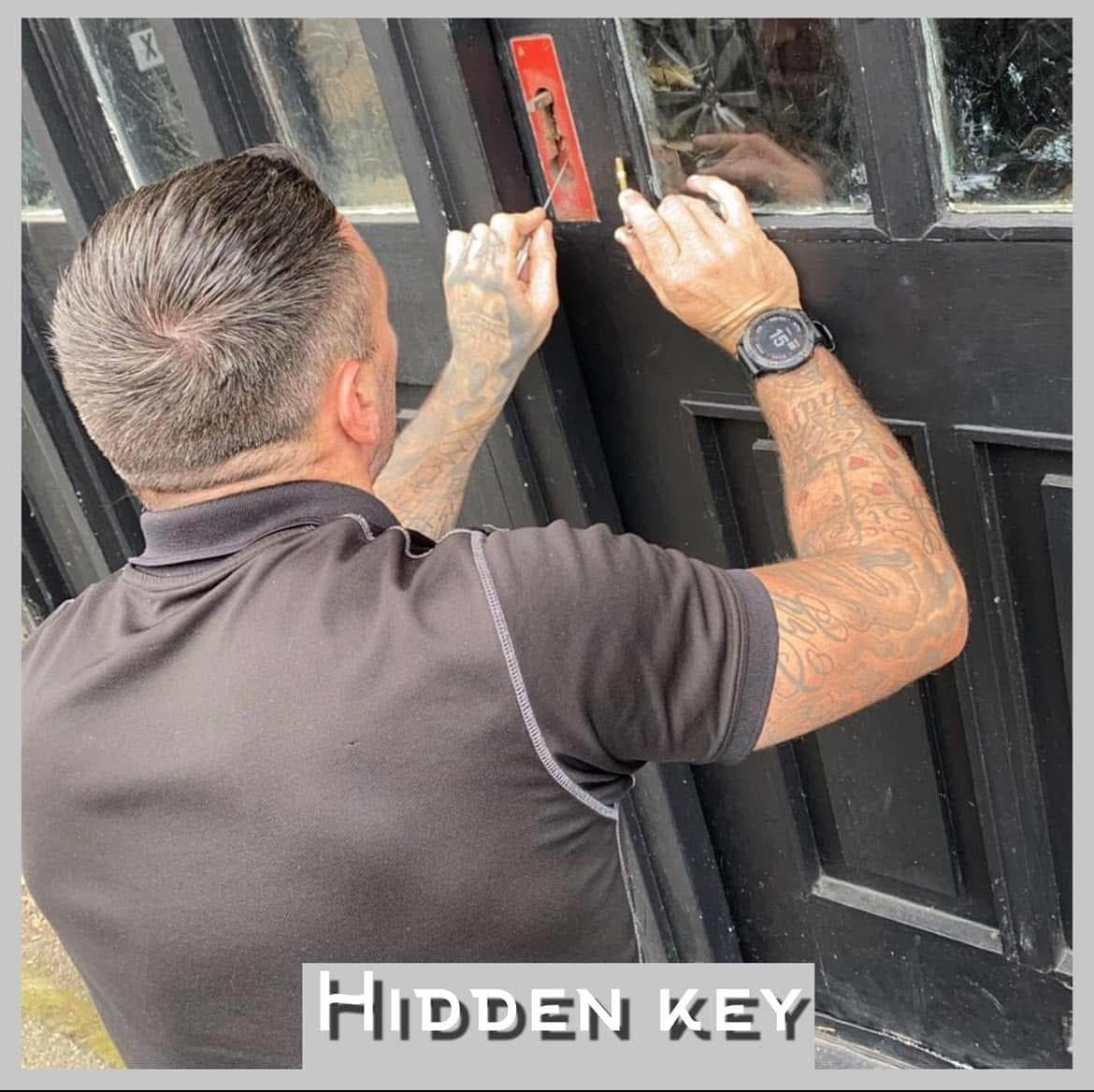 Leigh from Hidden Key Locksmiths working on a door lock in Burnley